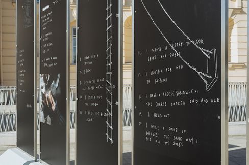 Several blackboards with white handwriting and drawings