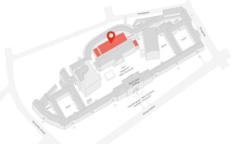 Gray 3D site plan of the Museumsquartier Wien with the area marked in red at the location of the Kunsthalle Wien