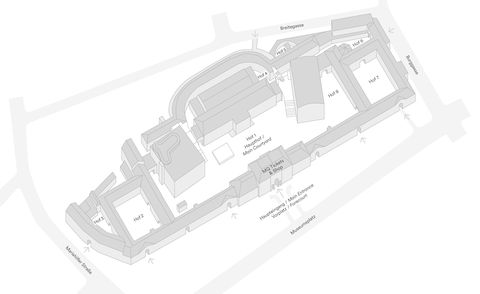 Grayscale architectural site map of the MuseumsQuartier Wien. The map includes various labeled structures and surrounding roads.