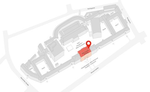 Grauer 3D-Arealsplan des Museumsquartier Wien mit rot markiertem Bereich an der Stelle des MQ Tickets & Shop