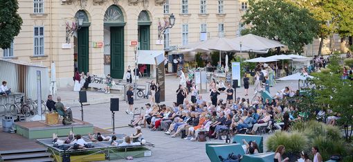 Audience at MQ Courtyard in front of MQ Summerstage