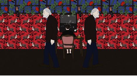 Two older men in dark clothing walk past a table where a person with black hair is seated, in front of a wall with red and blue floral patterns.
