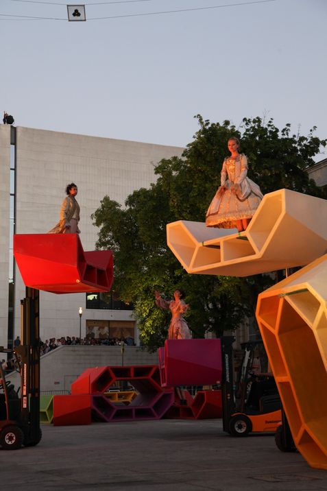 Dance performance on colorful Enzis at MuseumsQuartier at dusk