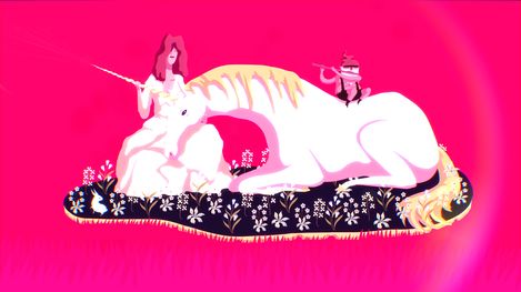 A reclining unicorn figure with yellow mane on a black carpet with white flowers and a white rabbit, a woman with red hair and white dress sitting on it, next to a small man with red hat playing a flute.