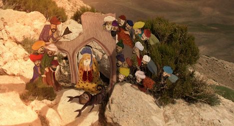 Group of illustrated figures gathered around an elderly man beneath a small stone arch.