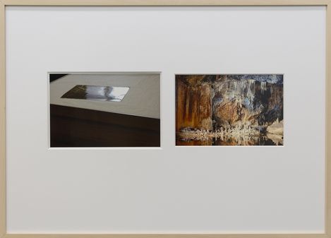 Two photographs side by side in a white frame, left showing a shiny rectangular surface on a table, right showing a cave scene with stalactites and stalagmites.