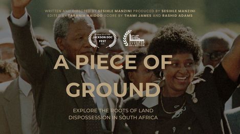 Several people with raised arms in front of text titled "A PIECE OF GROUND" and subtitle "EXPLORE THE ROOTS OF LAND DISPOSSESSION IN SOUTH AFRICA".