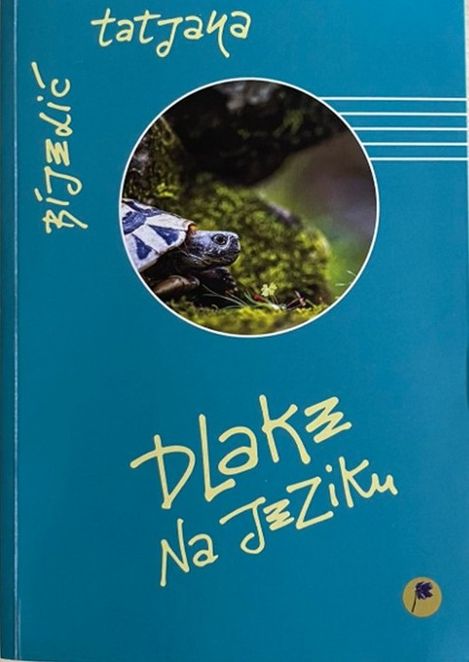 Book cover with round photo of a turtle on moss and handwritten yellow text on blue background.
