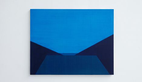 Abstract painting with geometric shapes in various shades of blue on a white wall