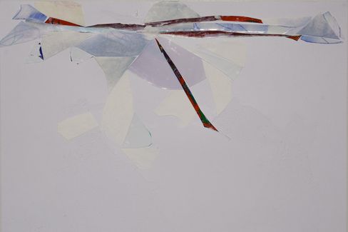 Abstract collage with irregular cut paper pieces in various colors on a light background.