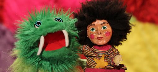 The photo shows Lady Kasperl and the Cuddly Fluffy Monster.