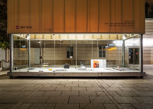 MQ Art Box at night with illuminated installation by Marina Sula inside.