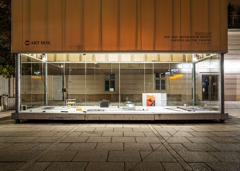 MQ Art Box at night with illuminated installation by Marina Sula inside.