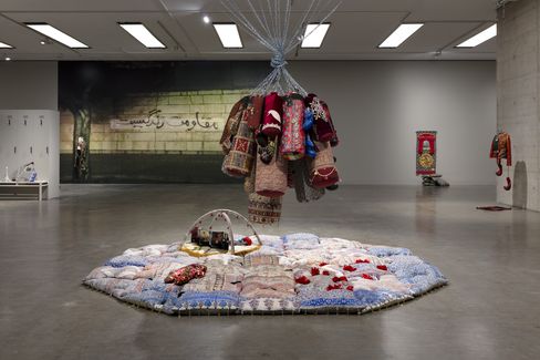 An exhibition space with sculptures by Chalisée Naamani.