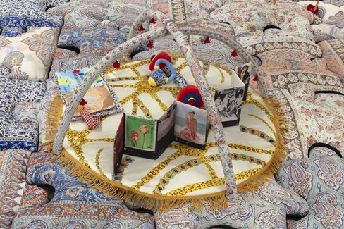 A sculpture by Chalisée Naamani featuring a fabric book.