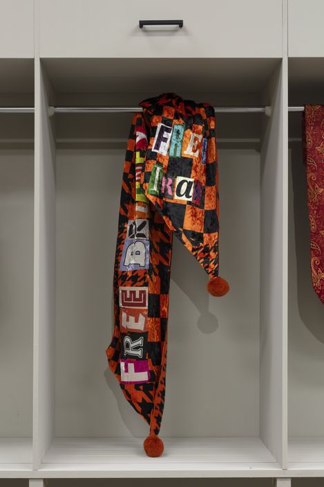 A scarf by Chalisée Naamani with the words: Free Britney Free Iran.