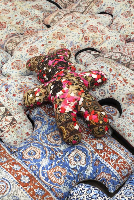 A sculpture by Chalisée Naamani in the shape of a teddy bear.