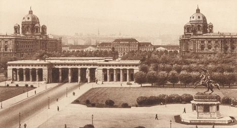 Black-and-white historical view of Heldenplatz in Vienna with the Maria Theresa Monument in the foreground and the domes of the museums and the Vienna Museum Quarter in the background