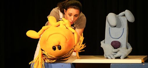 The two characters, Mr Grumpy and Miss Sunny, come across a female construction worker.