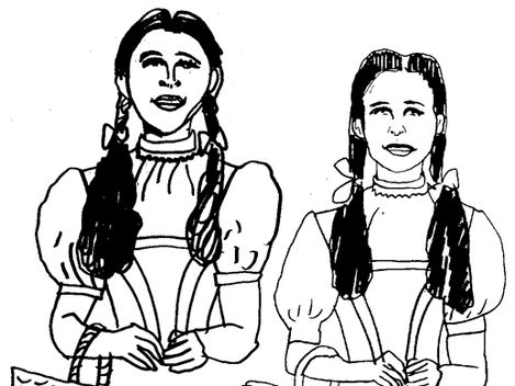 Two girls wearing dirndl dresses and braids are holding baskets in their hands.