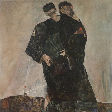 Two figures, intertwined, in dark, flowing robes stand on a textured surface. Their expressions are somber, conveying a sense of intimacy and melancholy.